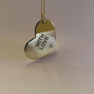 Heart-shaped pendant. I love you necklace.